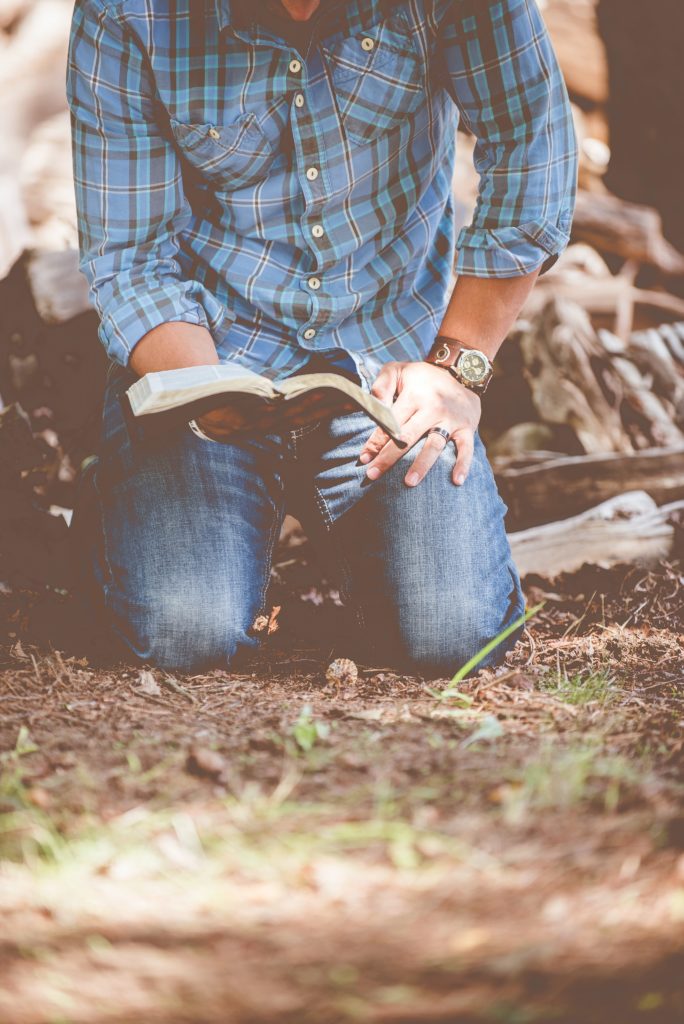 Man on Knees Praying